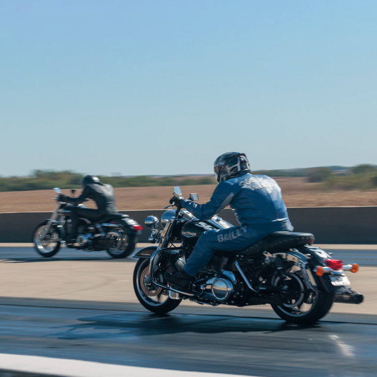 Drag race motorcycles on the strip